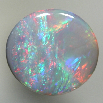 SOLID SEMI BLACK OPAL Pretty opal, reds to purple to green to red